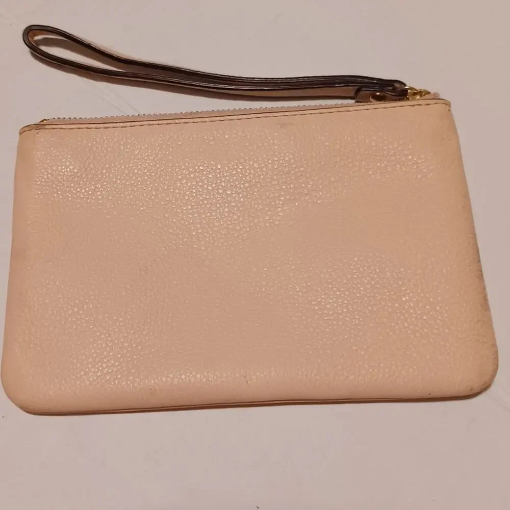 Kate Spade New York Pink Tone Wristlet.